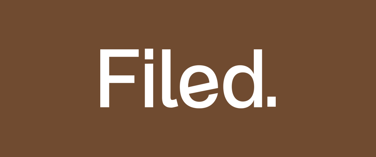Filed logo wordmark in white on an espresso brown background