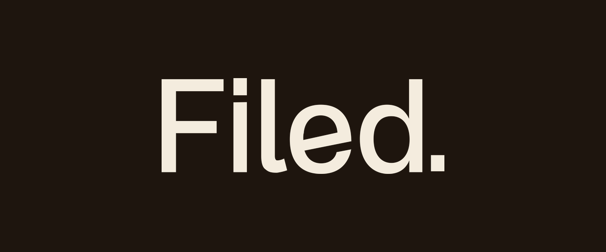Filed logo wordmark in cream on a dark brown background